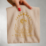 Trust The Signs Moon Phase Tee — Celestial Spiritual Graphic Shirt