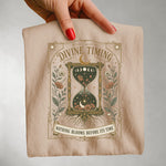 Divine Timing Hourglass Tee — Nothing Blooms Before Its Time Spiritual Shirt