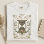 Divine Timing Hourglass Tee — Nothing Blooms Before Its Time Spiritual Shirt