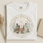 Light a Little Magic Tee — Candle Crystal Moon Water Shirt